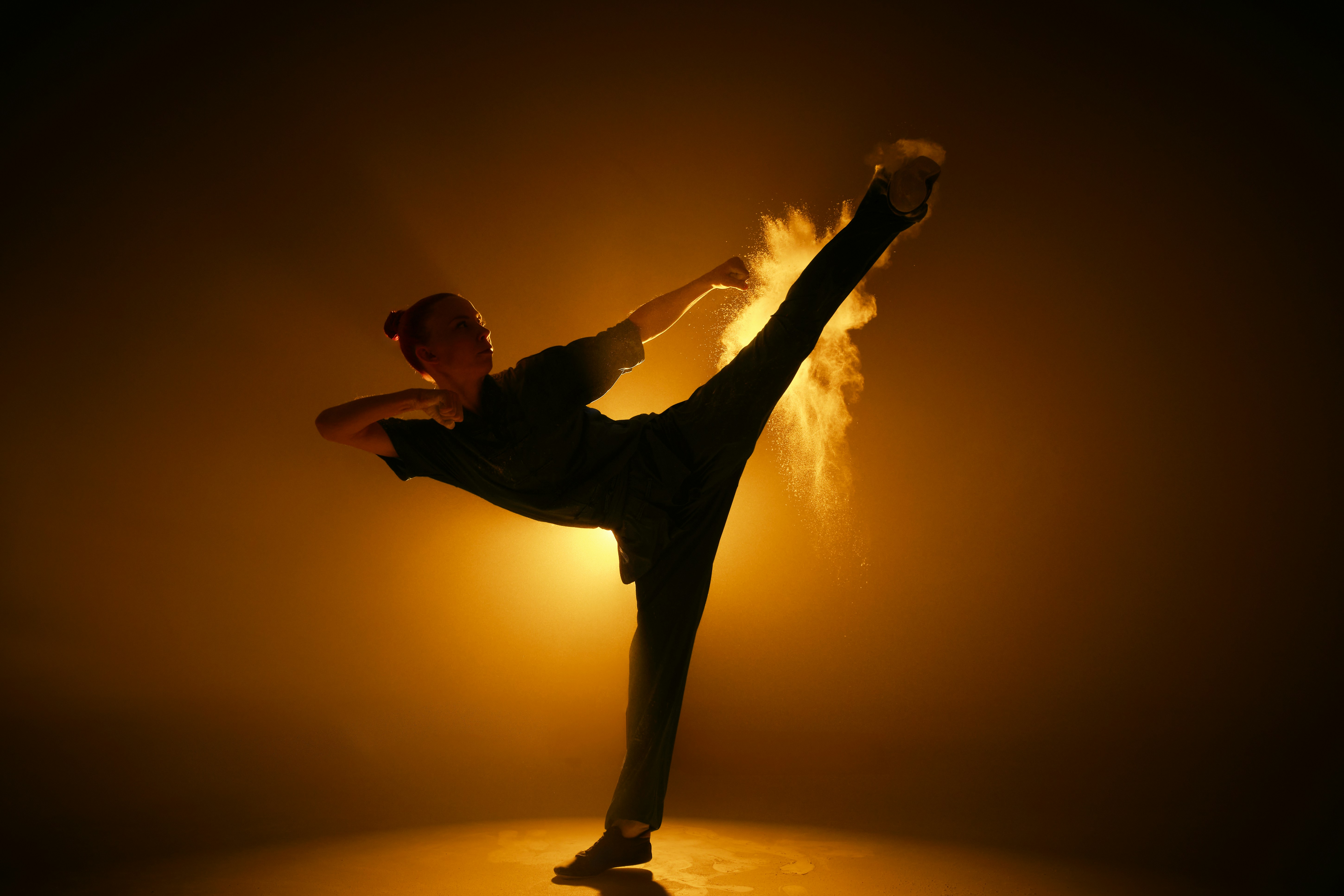 Wushu specialist performing a kick